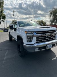 Clean exterior of a white Chevrolet truck